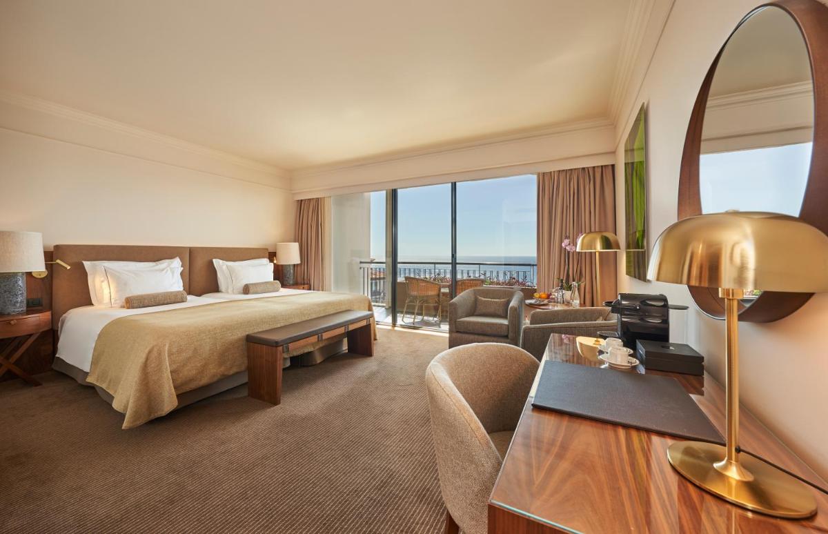 Uma cama ou camas num quarto em The Cliff Bay - PortoBay