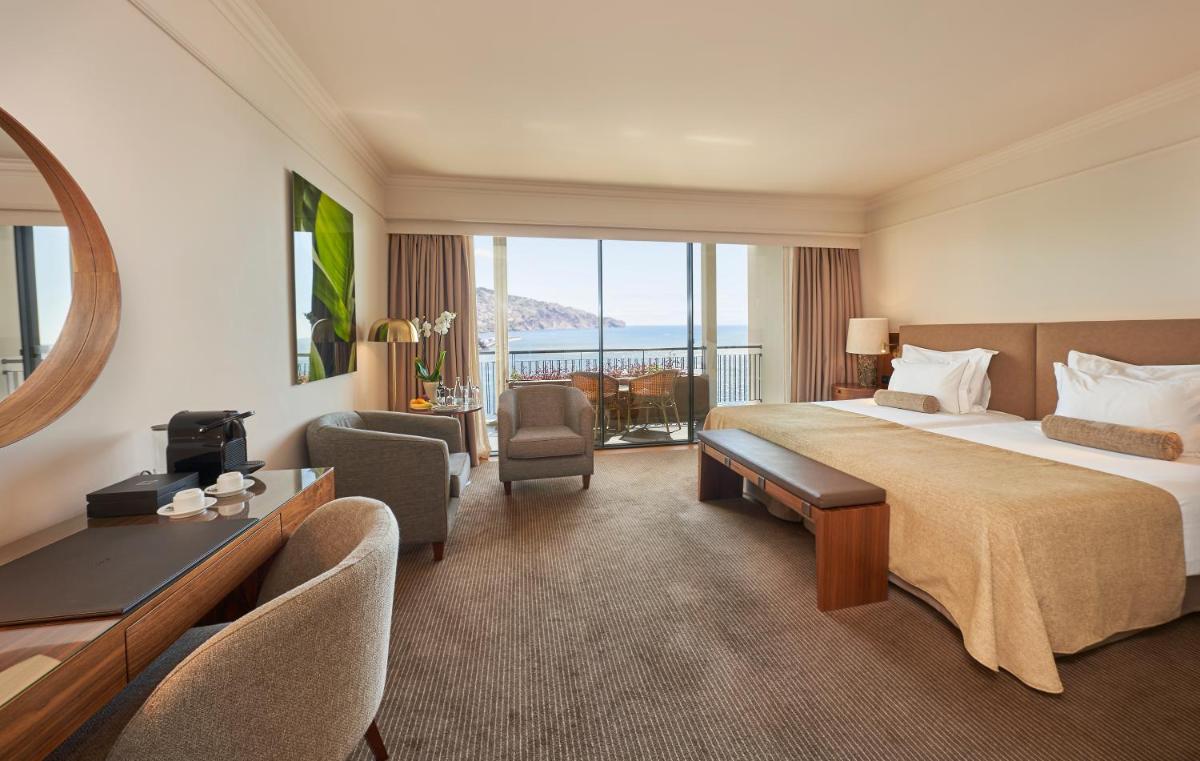 Uma cama ou camas num quarto em The Cliff Bay - PortoBay