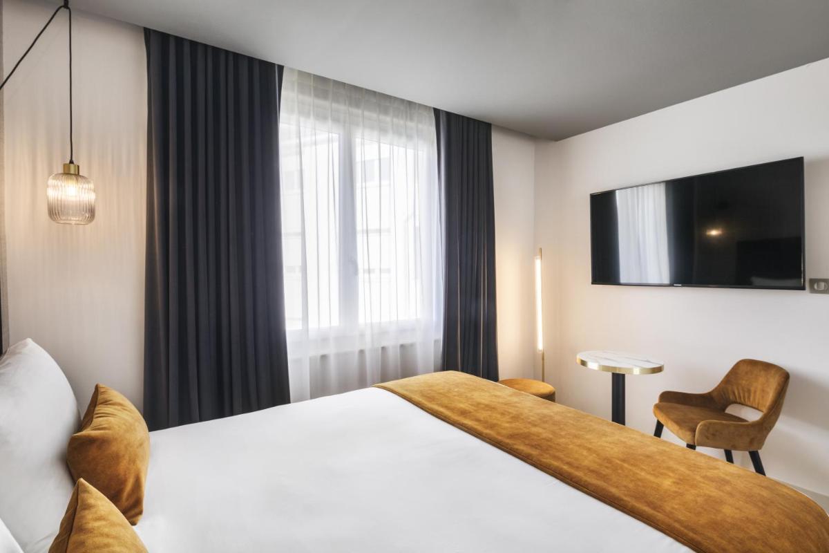 Un ou plusieurs lits dans un hébergement de l'établissement Hôtel & Spa Le Maury, Vannes, The Originals Boutique