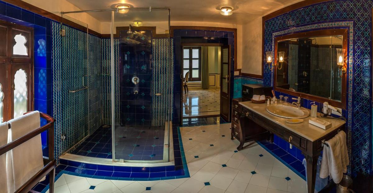 a large bathroom with a shower and a sink at Royal Heritage Haveli - By Leisure Hotels in Jaipur