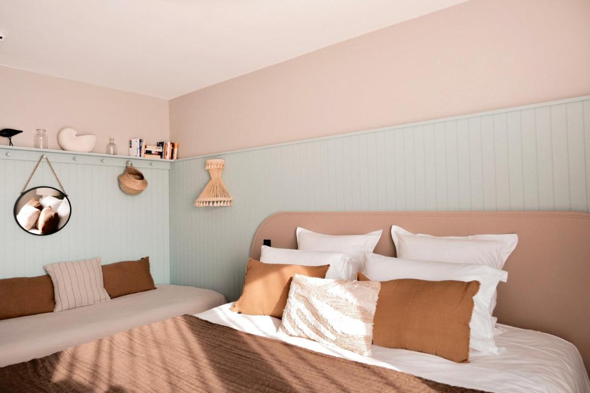 Un ou plusieurs lits dans un hébergement de l'établissement Emeria Dinard Thalasso Spa