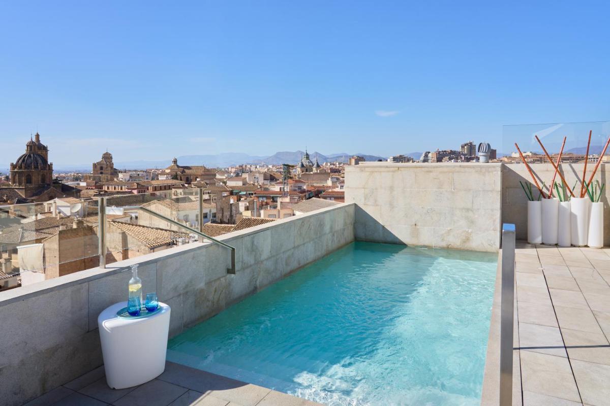 Piscina en o cerca de Hotel Maciá Granada Five Senses Rooms & Suites
