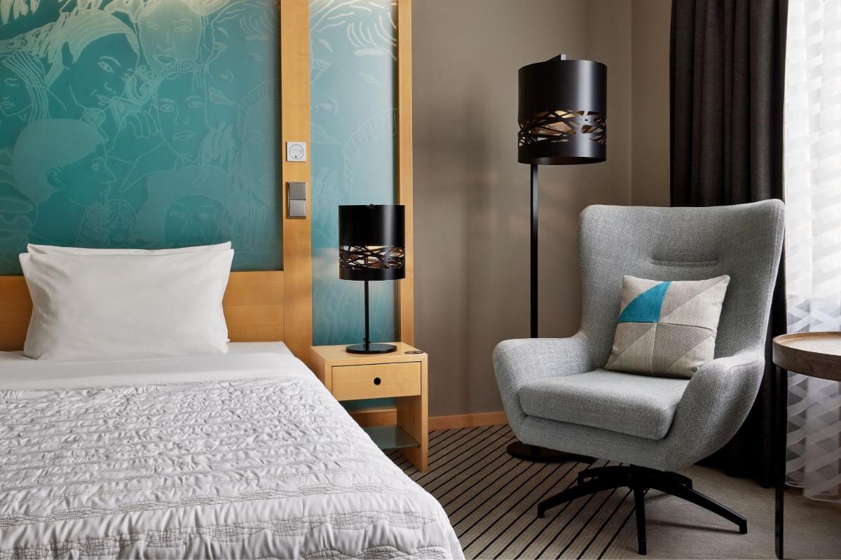 Ein Bett oder Betten in einem Zimmer der Unterkunft Le Méridien Hamburg