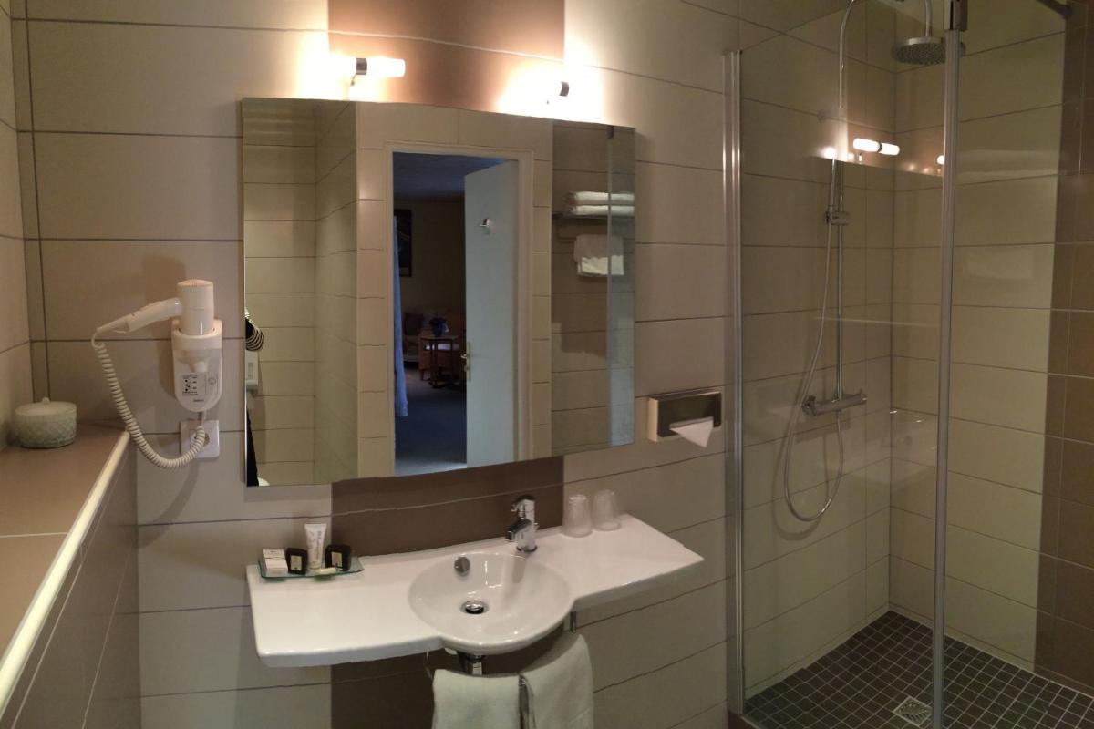 Salle de bains dans l'établissement Hôtel Restaurant Taillard