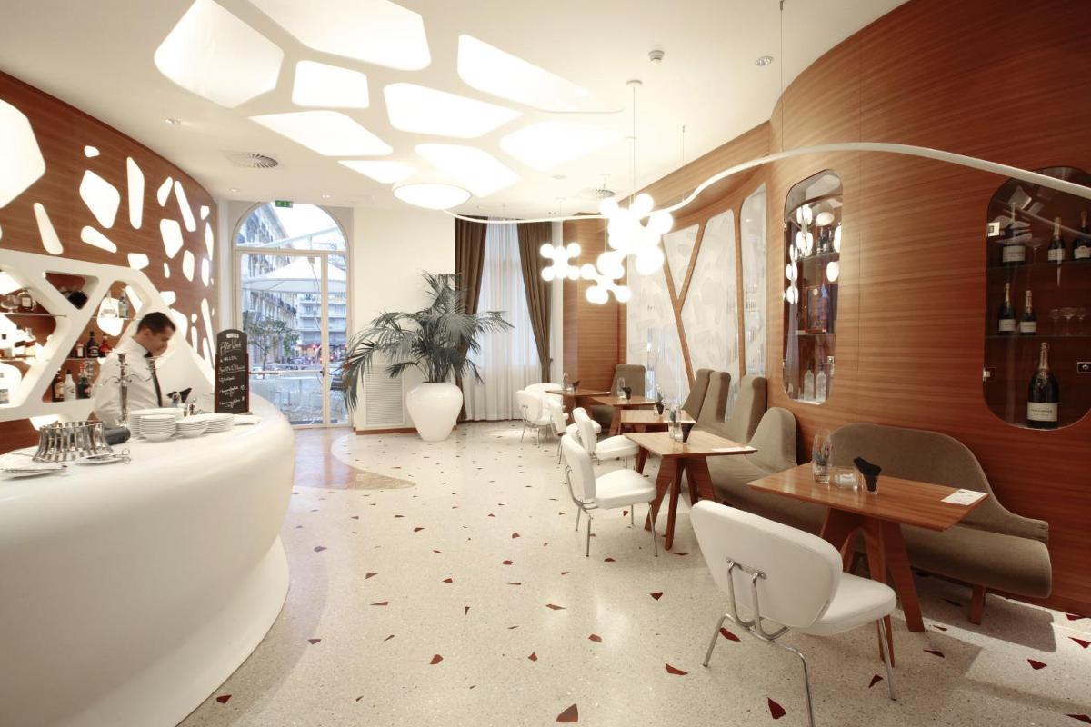 Coin salon dans l'établissement Boscolo Nice Hotel & Spa