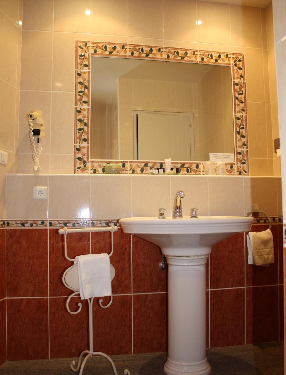 Salle de bains dans l'établissement Hôtel Restaurant Taillard