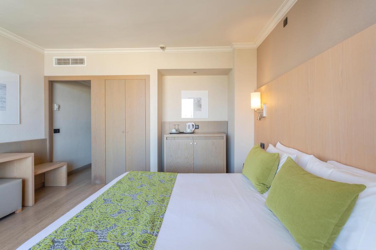 Cama o camas de una habitación en Marins Playa