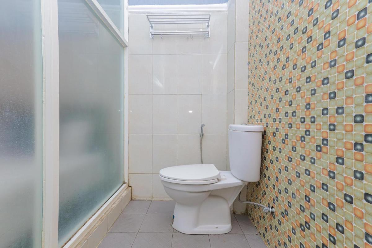 Urbanview Hotel Syariah Near Gelora Delta Sidoarjo - Housity