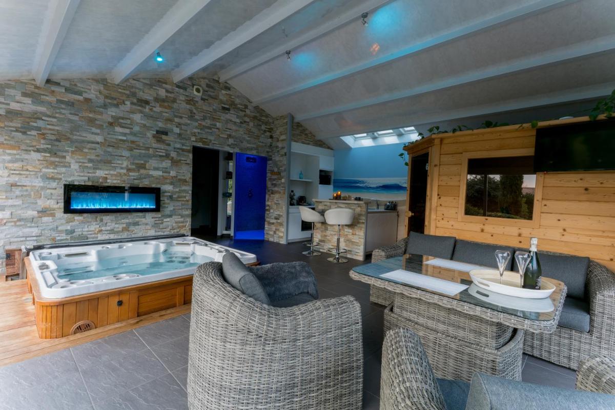 Charmante maison avec spa, sauna et jardin privatif - Housity