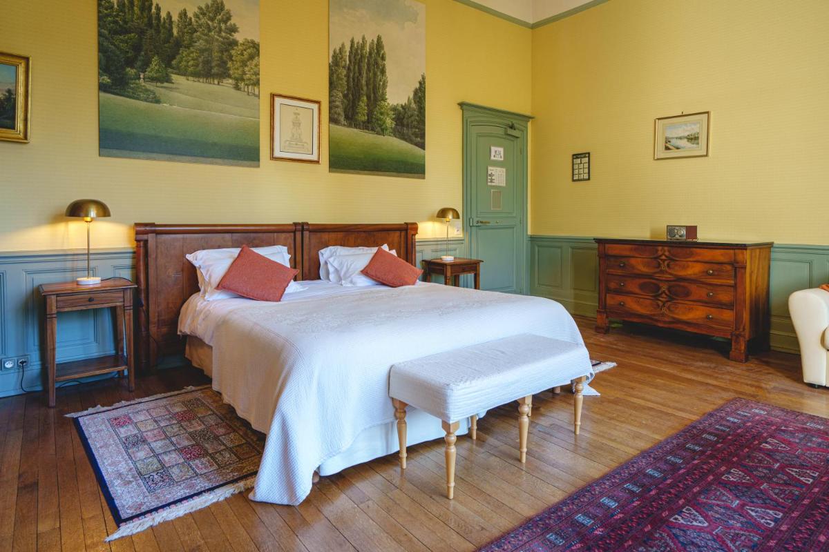 Un ou plusieurs lits dans un hébergement de l'établissement Château La Comtesse de Loire & Spa