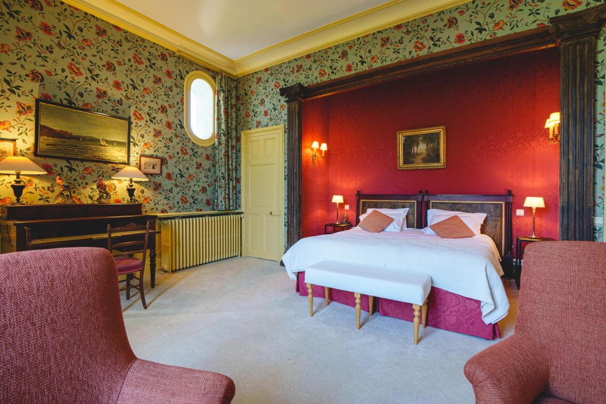 Un ou plusieurs lits dans un hébergement de l'établissement Château La Comtesse de Loire & Spa