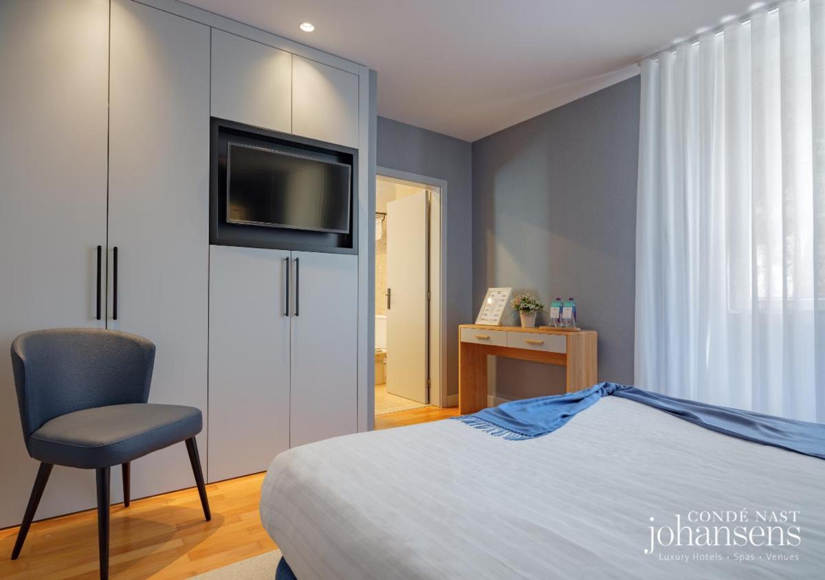 Uma cama ou camas num quarto em Pure Monchique Hotel - Villa Termal Spa Resort - by Unlock Hotels