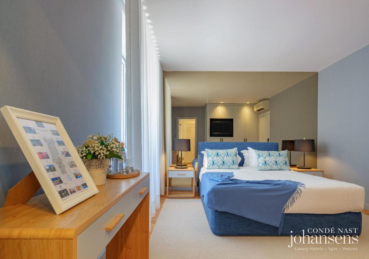 Uma cama ou camas num quarto em Pure Monchique Hotel - Villa Termal Spa Resort - by Unlock Hotels