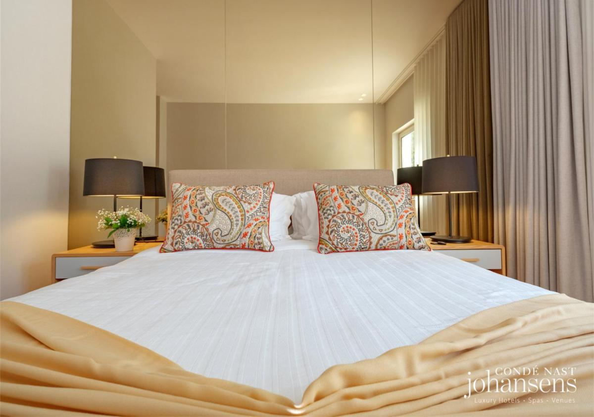 Uma cama ou camas num quarto em Pure Monchique Hotel - Villa Termal Spa Resort - by Unlock Hotels