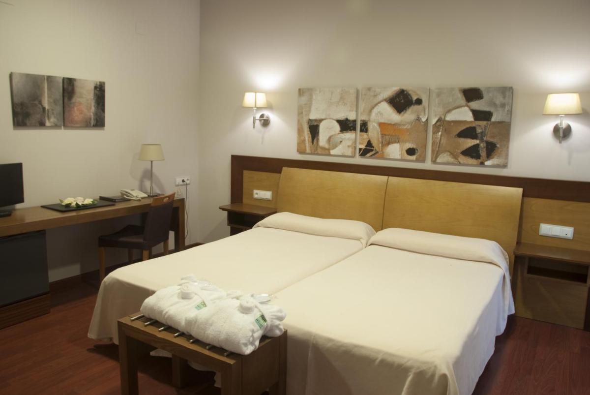 Cama o camas de una habitación en Salugral Termal Resort