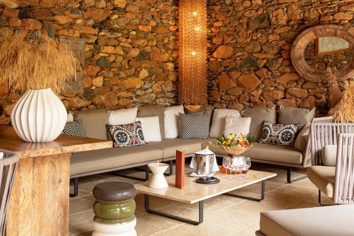Coin salon dans l'établissement Hôtel La Dimora & Spa