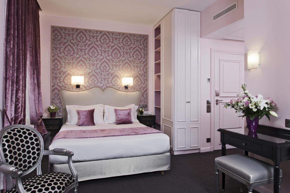 Un ou plusieurs lits dans un hébergement de l'établissement Hôtel Saint-Pétersbourg Opéra & Spa