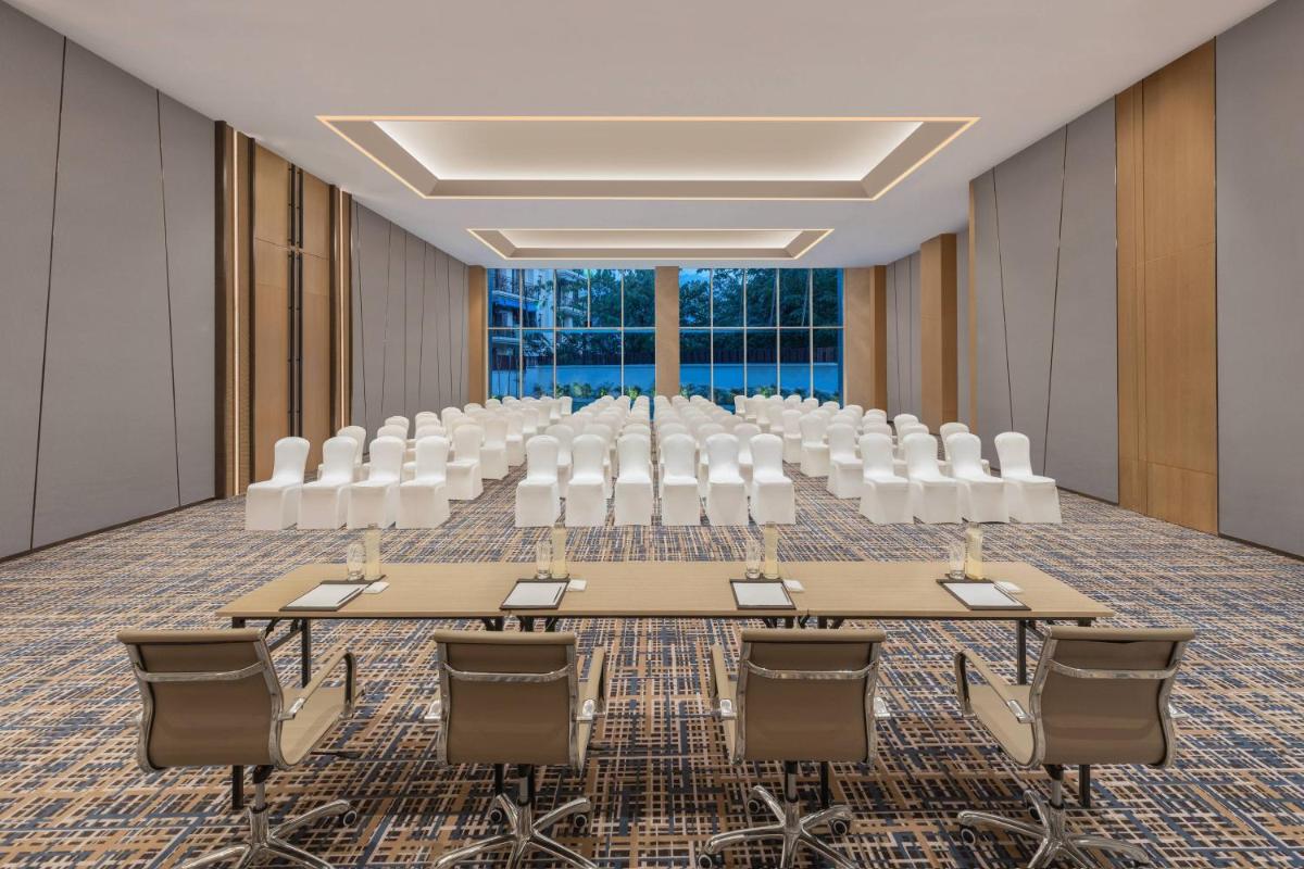 a conference room with a large table and chairs at Fairfield by Marriott Dehradun in Dehradun