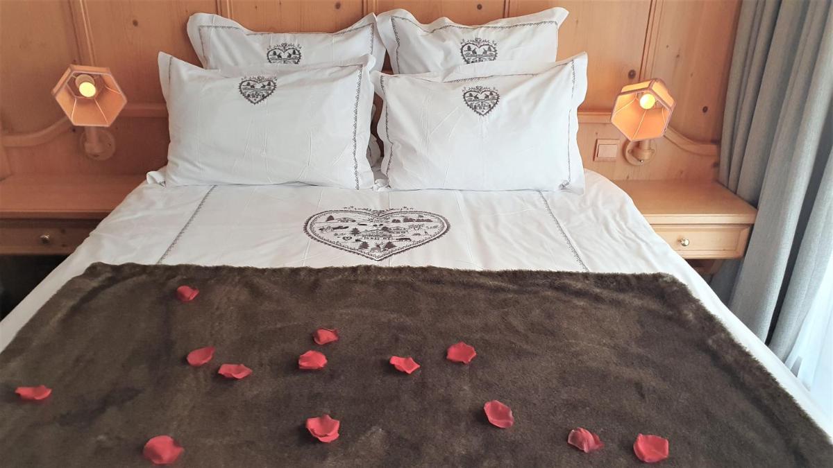 Un ou plusieurs lits dans un hébergement de l'établissement Hôtel Macchi Restaurant & Spa