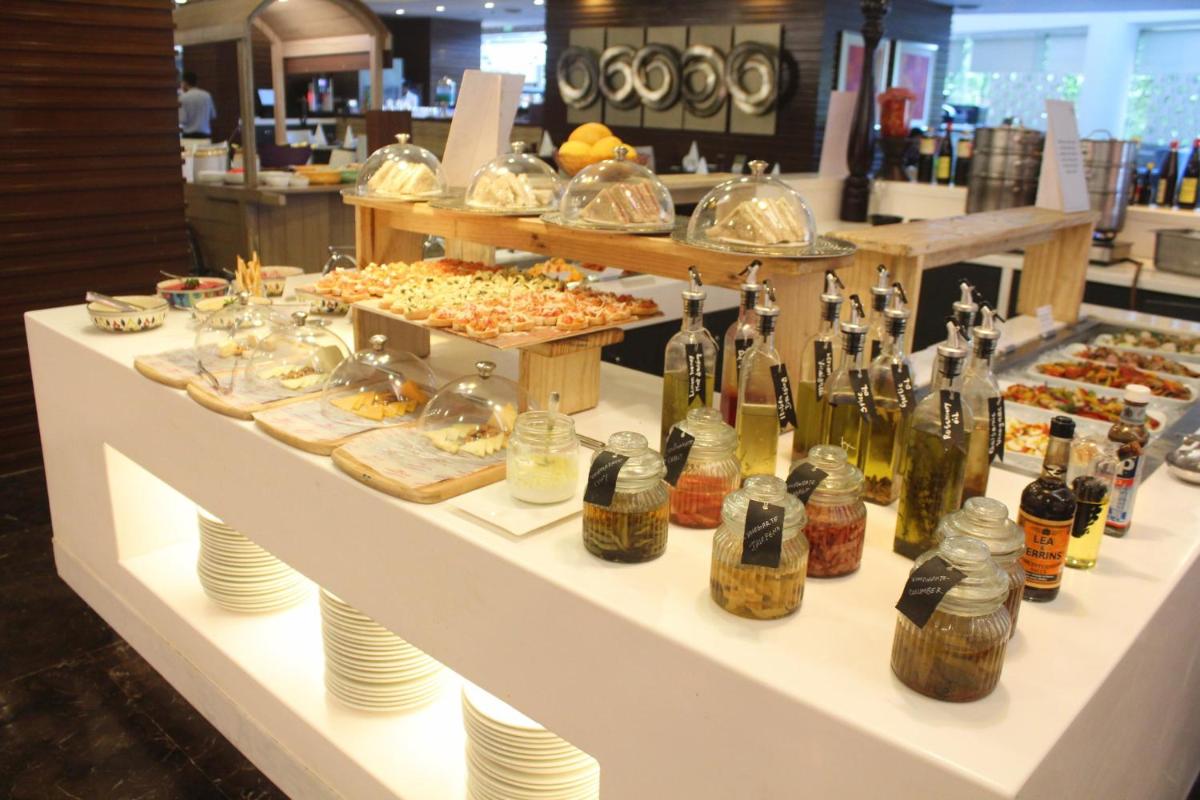 a buffet table with many different types of food at Crowne Plaza Ahmedabad City Centre by IHG in Ahmedabad