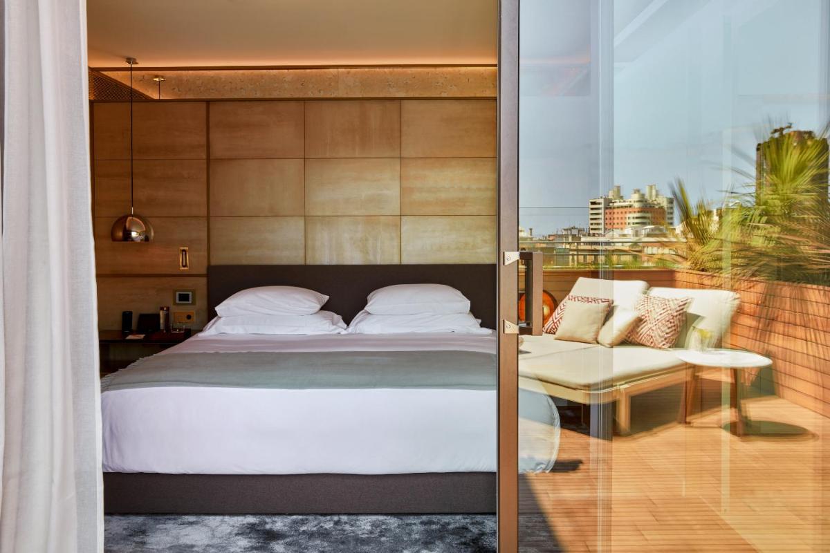 Cama o camas de una habitación en Almanac Barcelona