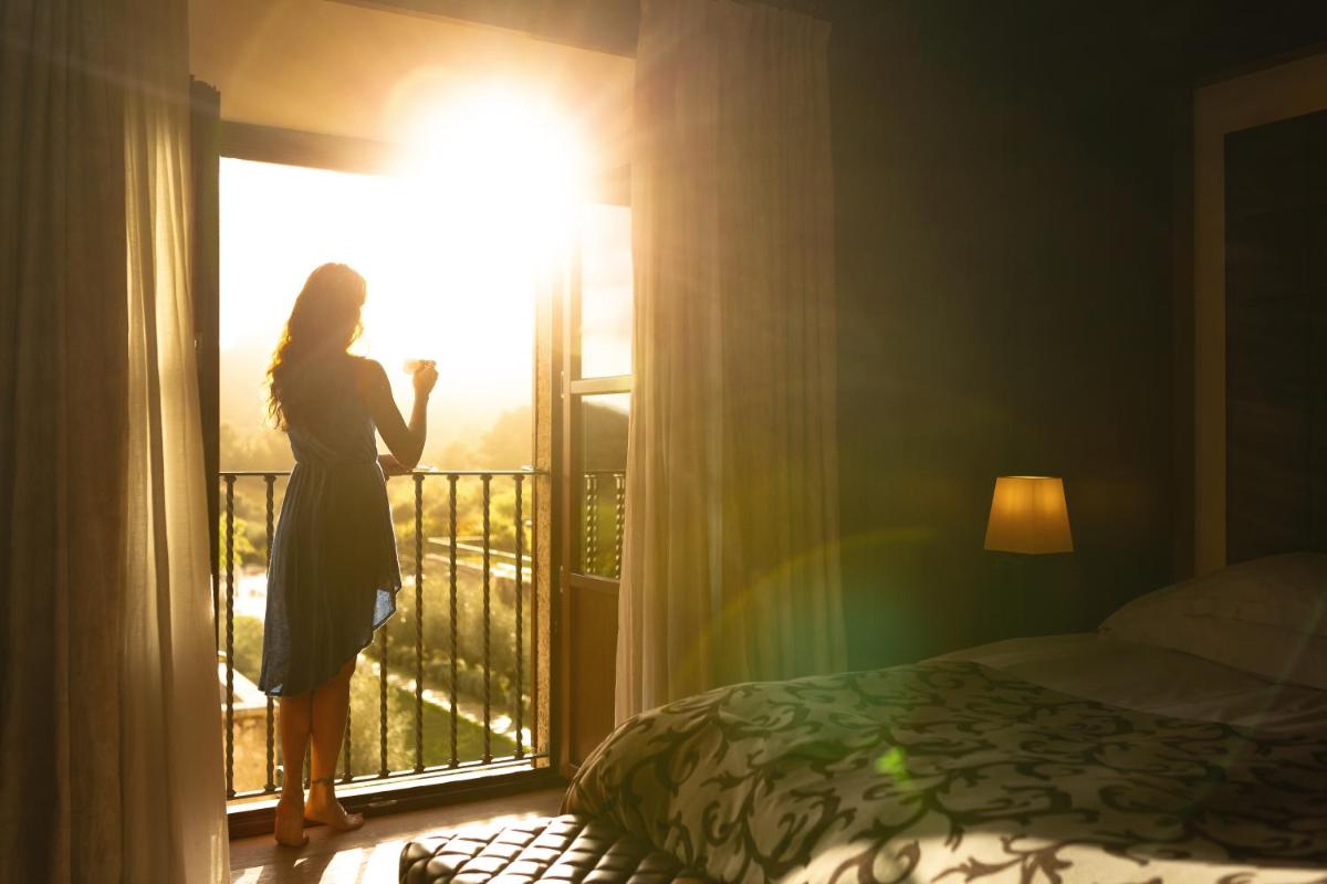 Cama o camas de una habitación en Castell Son Claret - The Leading Hotels of the World