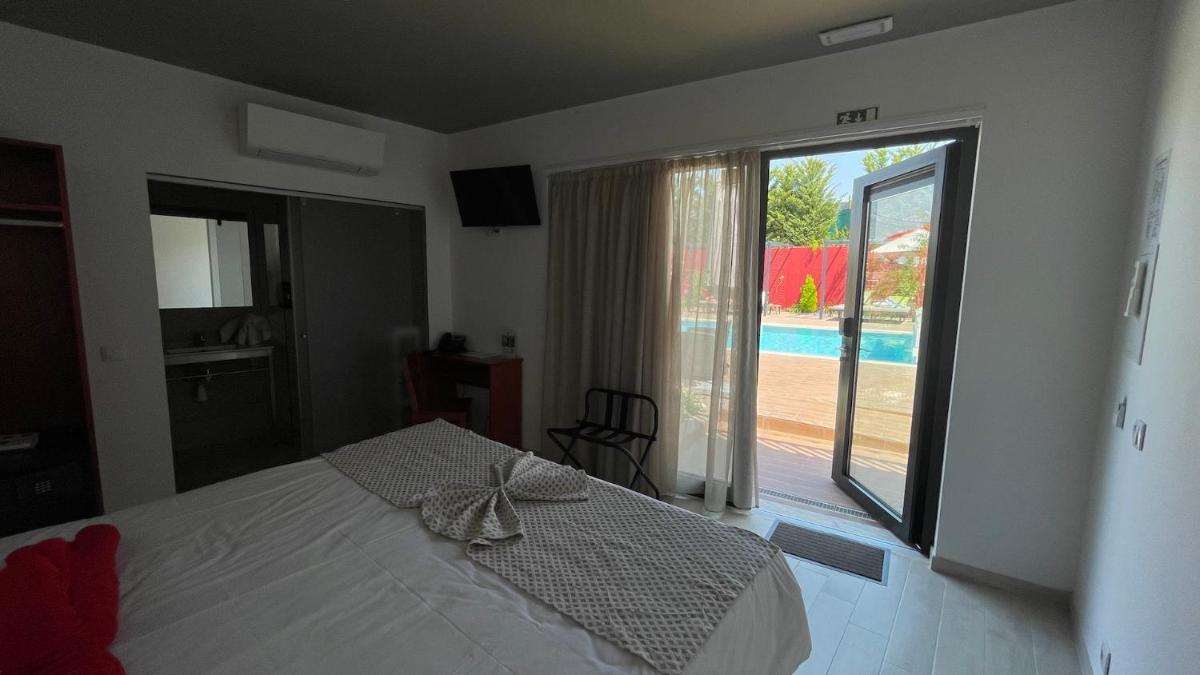 Uma cama ou camas num quarto em Villa 3 Caparica - Lisbon Gay Beach Resort