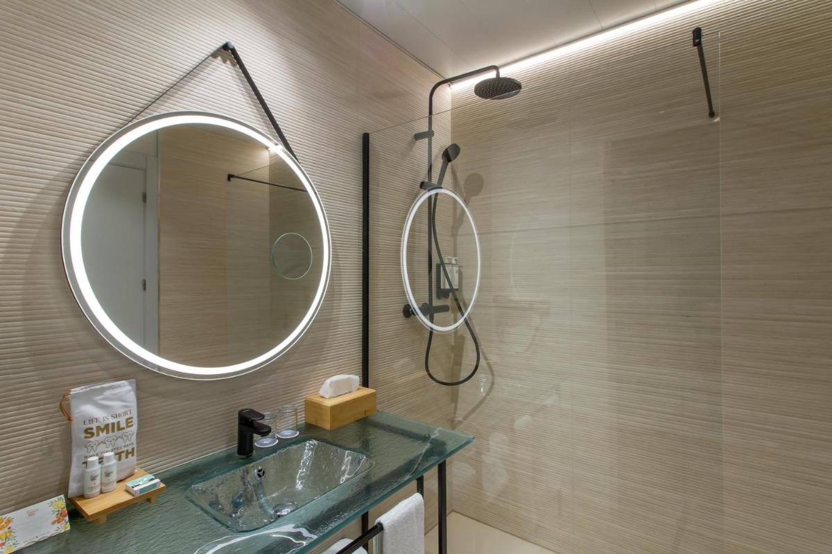 Un baño de SOLYMAR Gran Hotel