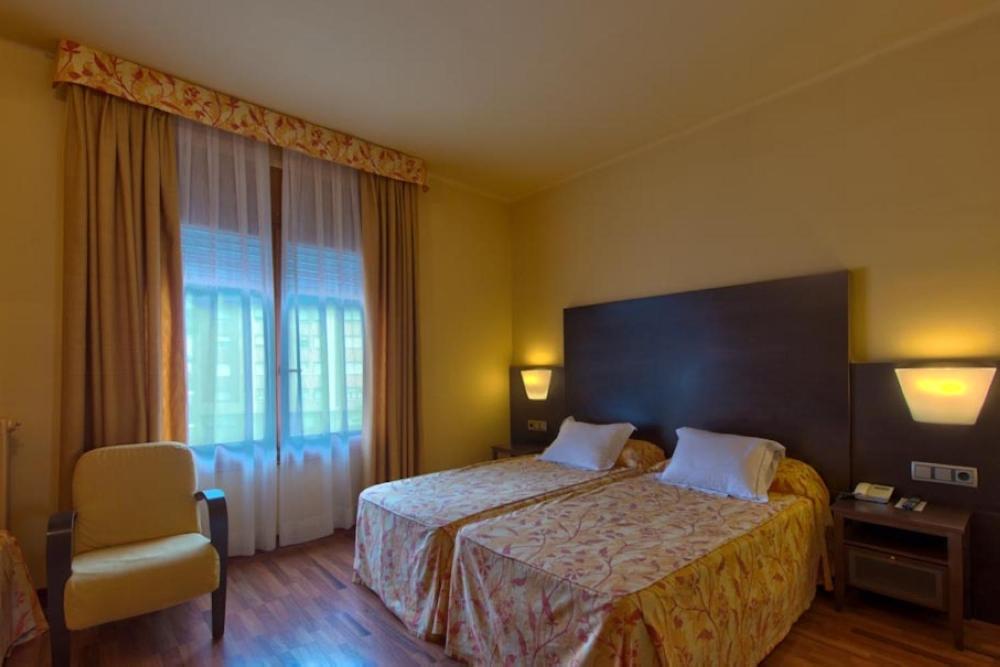 Cama o camas de una habitación en Hotel Restaurant Pessets & SPA