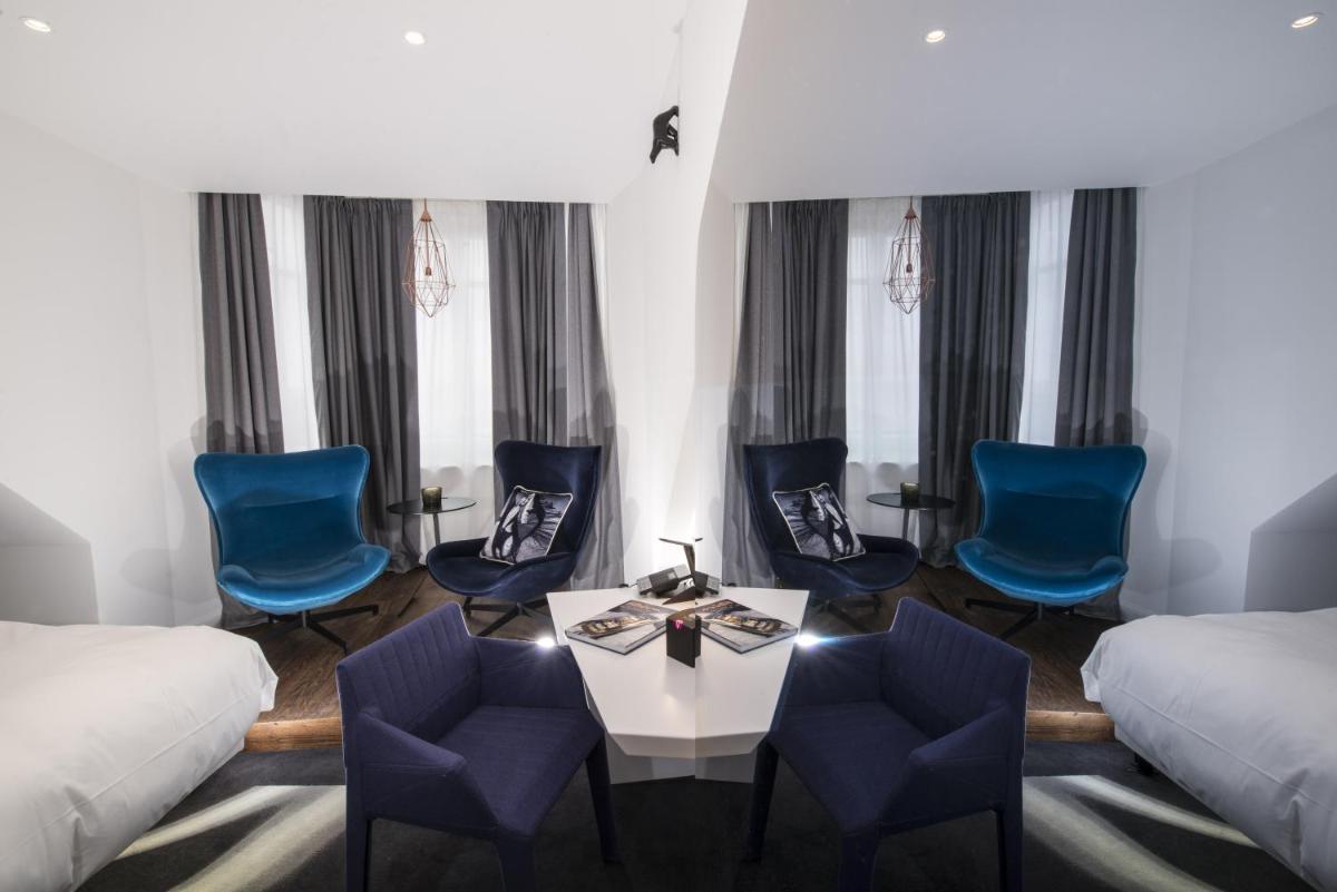 Coin salon dans l'établissement Vertigo Hotel, By Marriott, a Member of Design Hotels