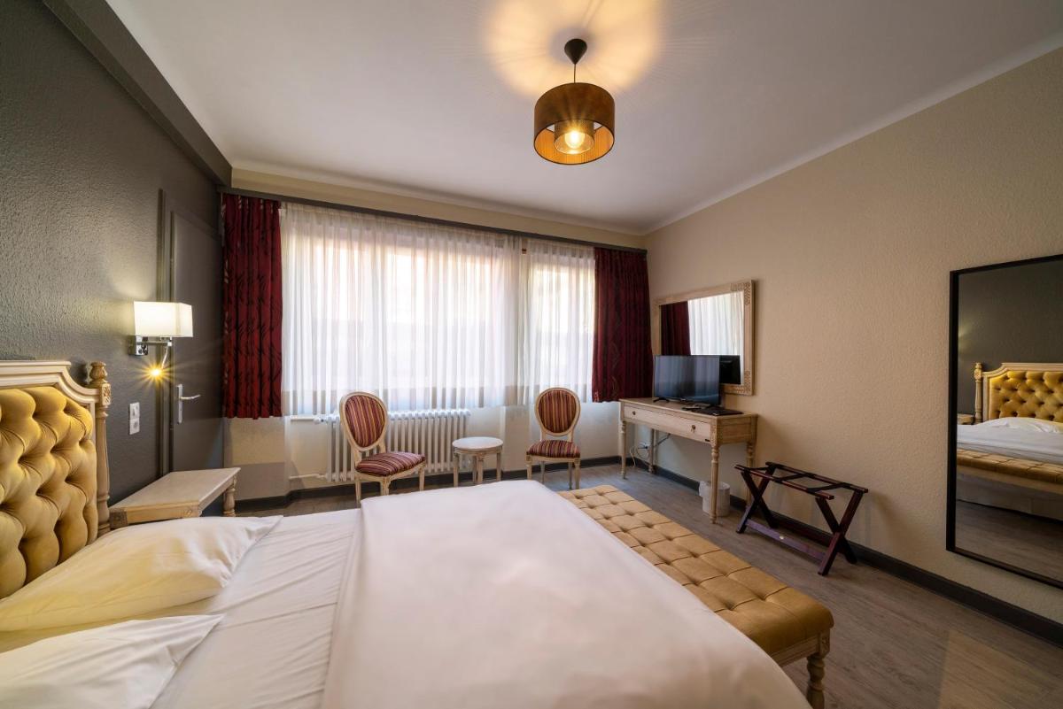 Un ou plusieurs lits dans un hébergement de l'établissement Hôtel du Parc, Restaurant, Spa & Wellness