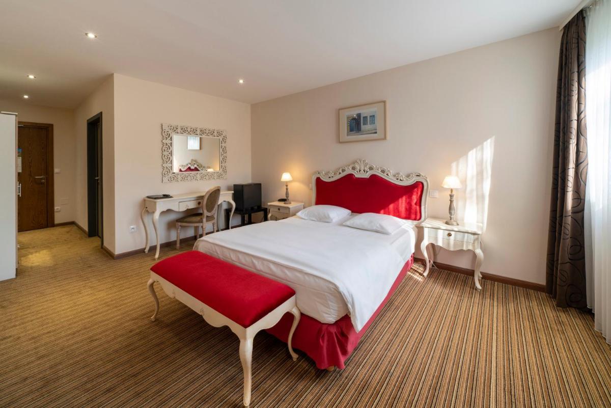 Un ou plusieurs lits dans un hébergement de l'établissement Hôtel du Parc, Restaurant, Spa & Wellness
