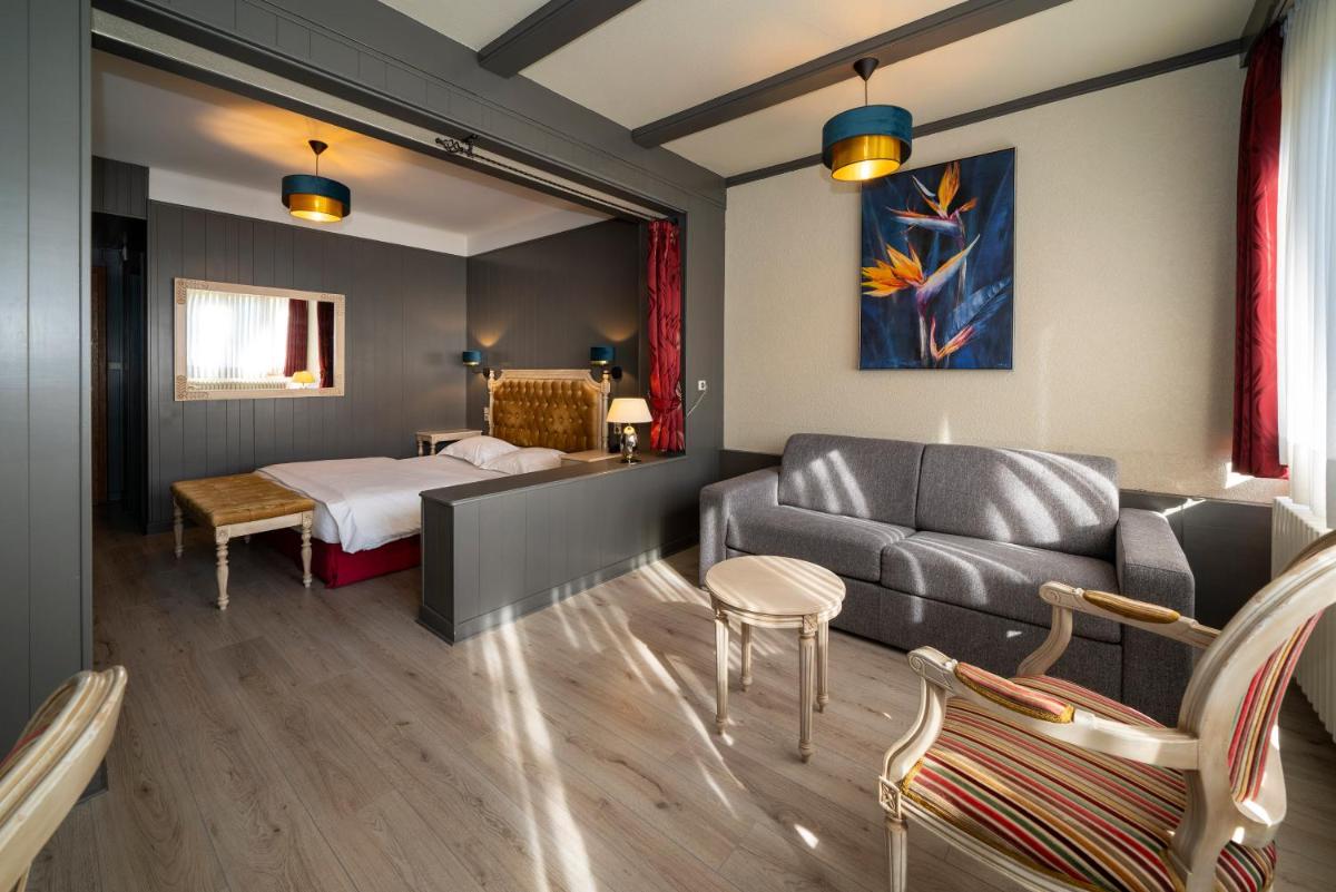 Coin salon dans l'établissement Hôtel du Parc, Restaurant, Spa & Wellness