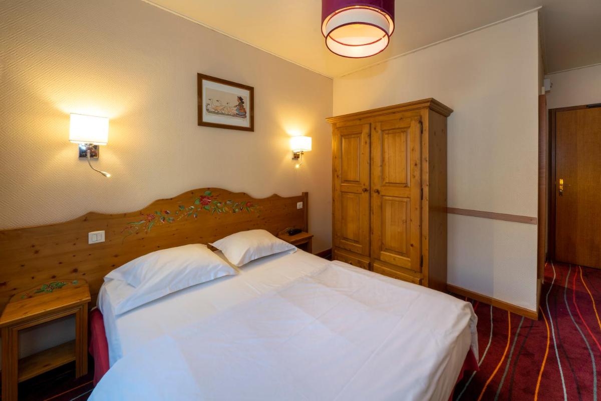 Un ou plusieurs lits dans un hébergement de l'établissement Hôtel du Parc, Restaurant, Spa & Wellness