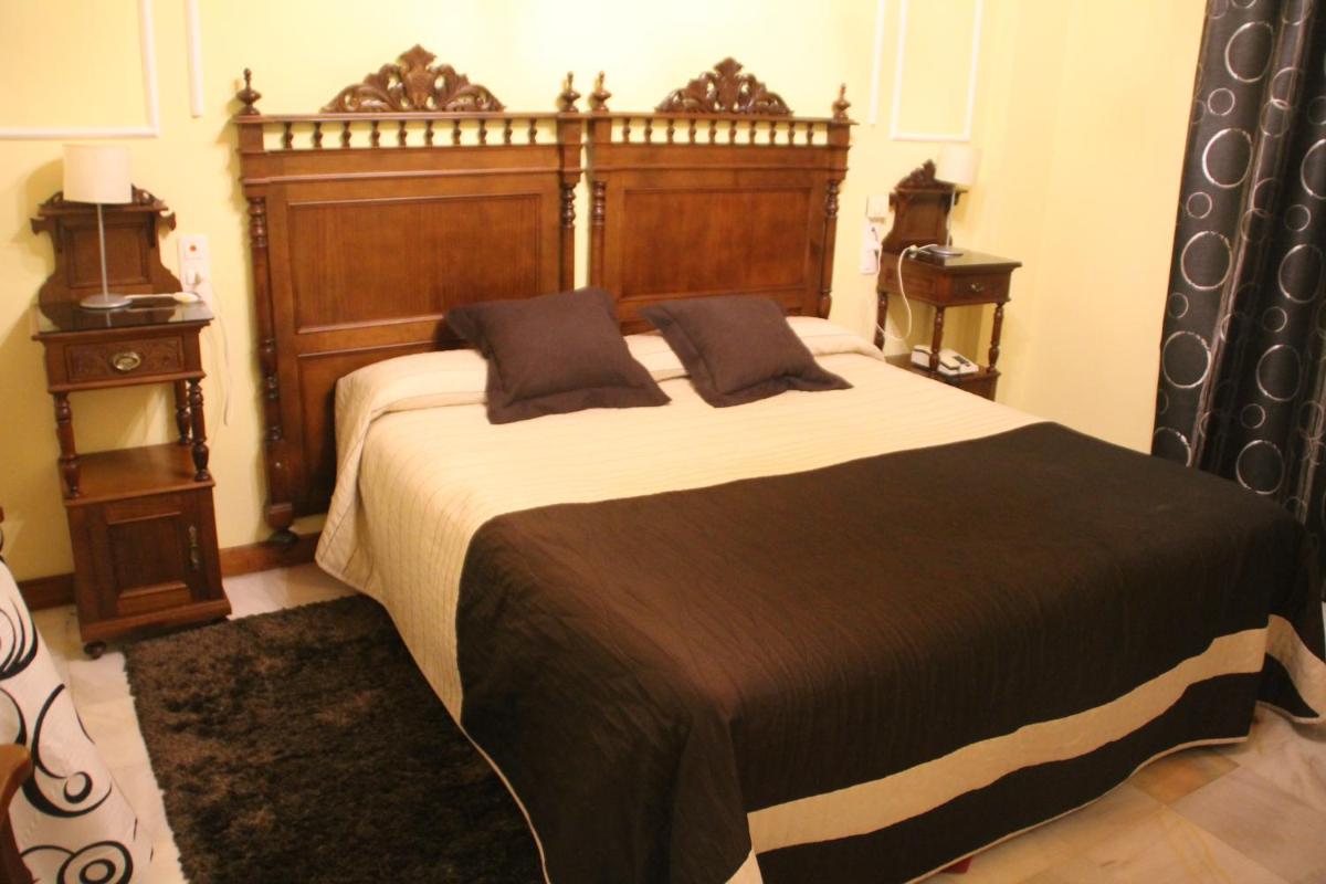 Cama o camas de una habitación en Hotel Palacio de Oñate