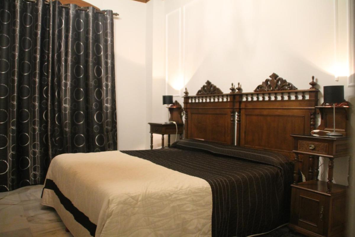 Cama o camas de una habitación en Hotel Palacio de Oñate