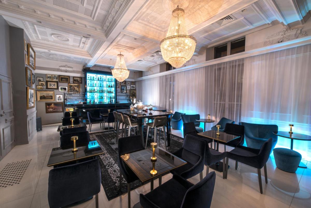 Coin salon dans l'établissement Vertigo Hotel, By Marriott, a Member of Design Hotels