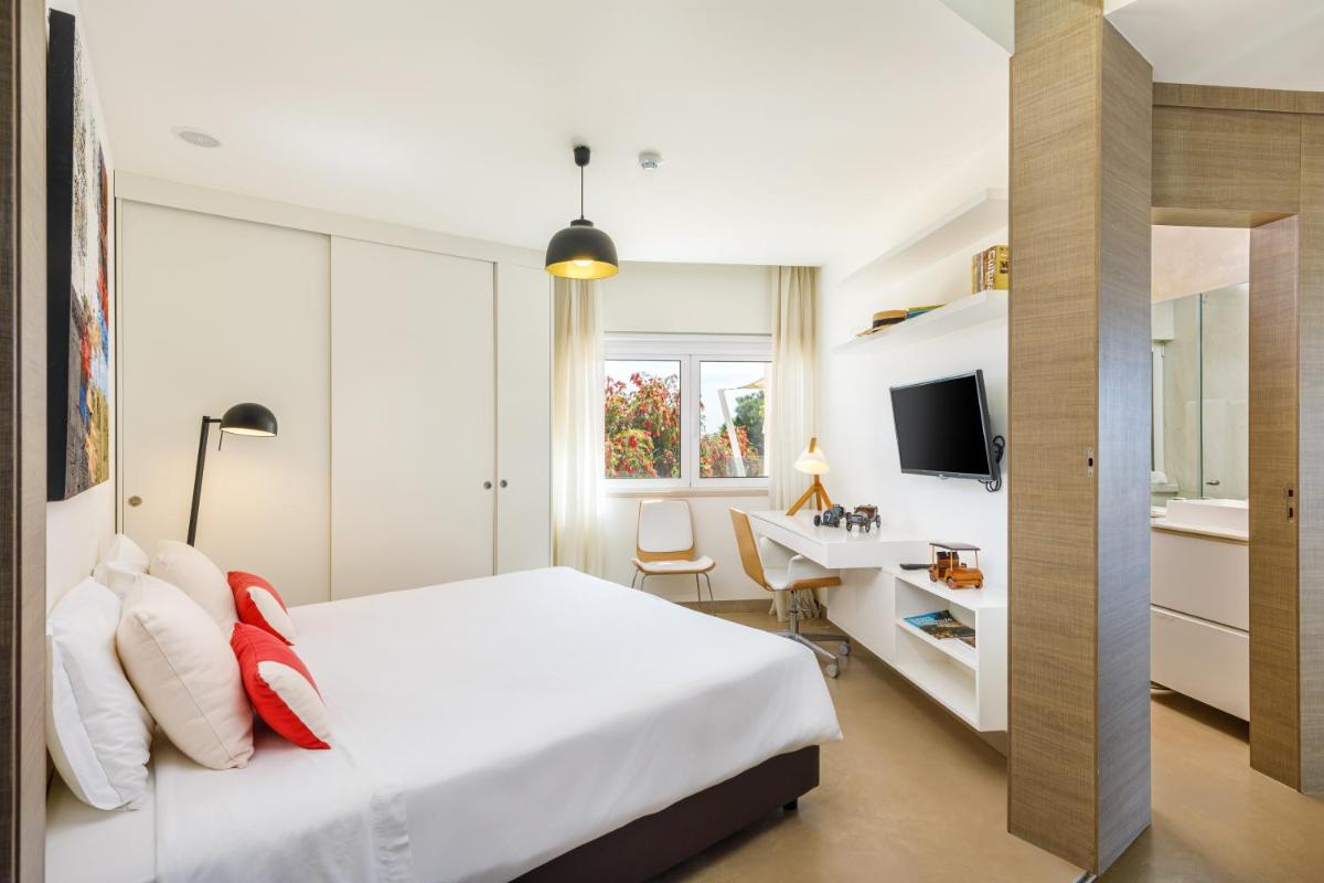 Uma cama ou camas num quarto em AP Adriana Beach Resort