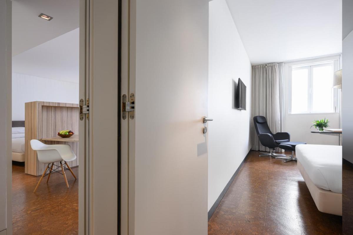 Uma área de estar em Inspira Liberdade Boutique Hotel