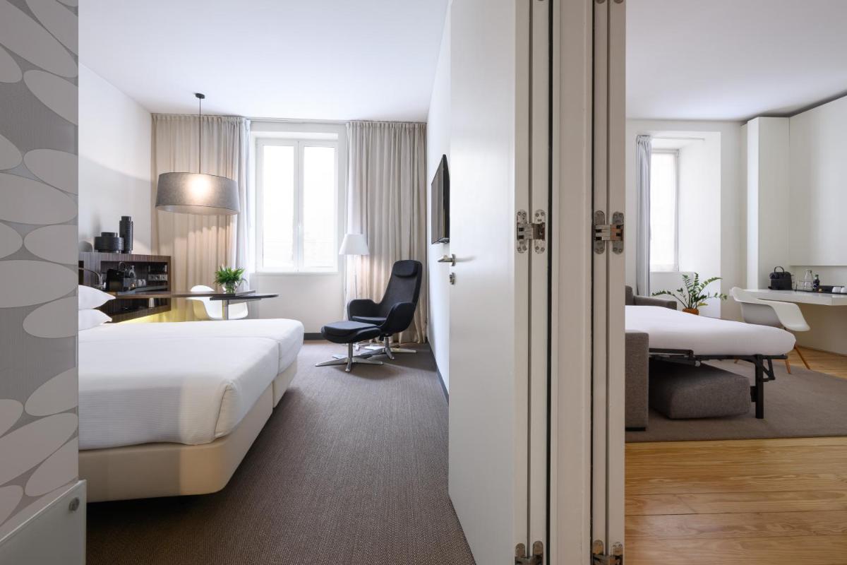 Uma cama ou camas num quarto em Inspira Liberdade Boutique Hotel