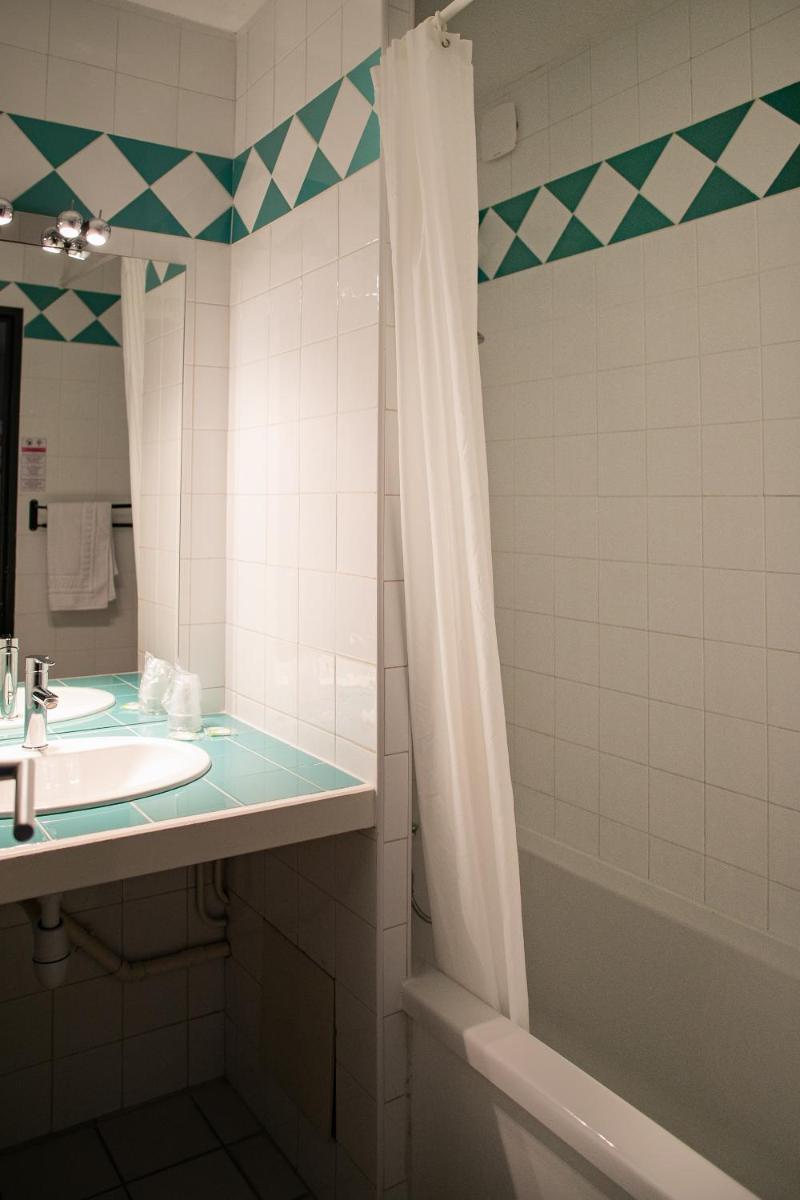 Salle de bains dans l'établissement Le Clos des Bruyères