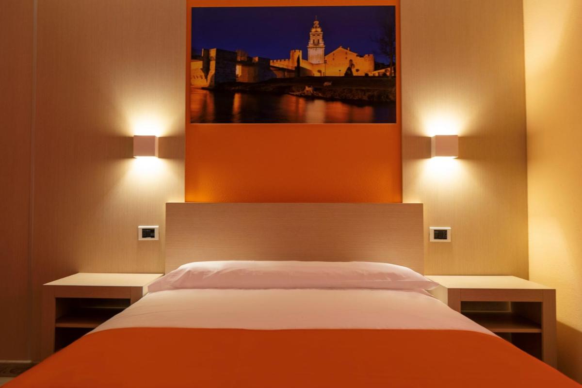 Cama o camas de una habitación en Hotel Spa Rio Ucero