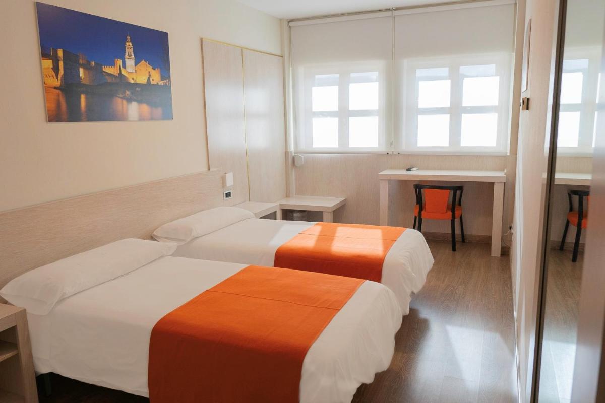 Cama o camas de una habitación en Hotel Spa Rio Ucero