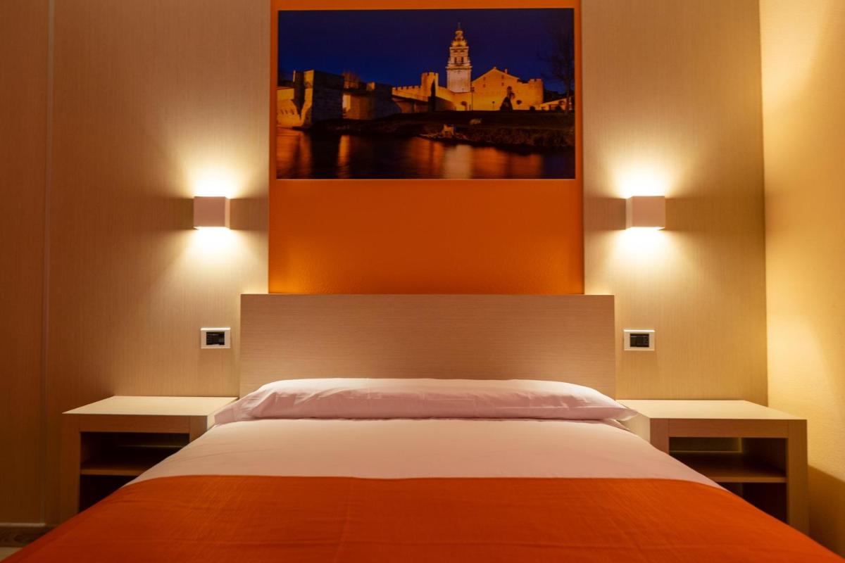 Cama o camas de una habitación en Hotel Spa Rio Ucero