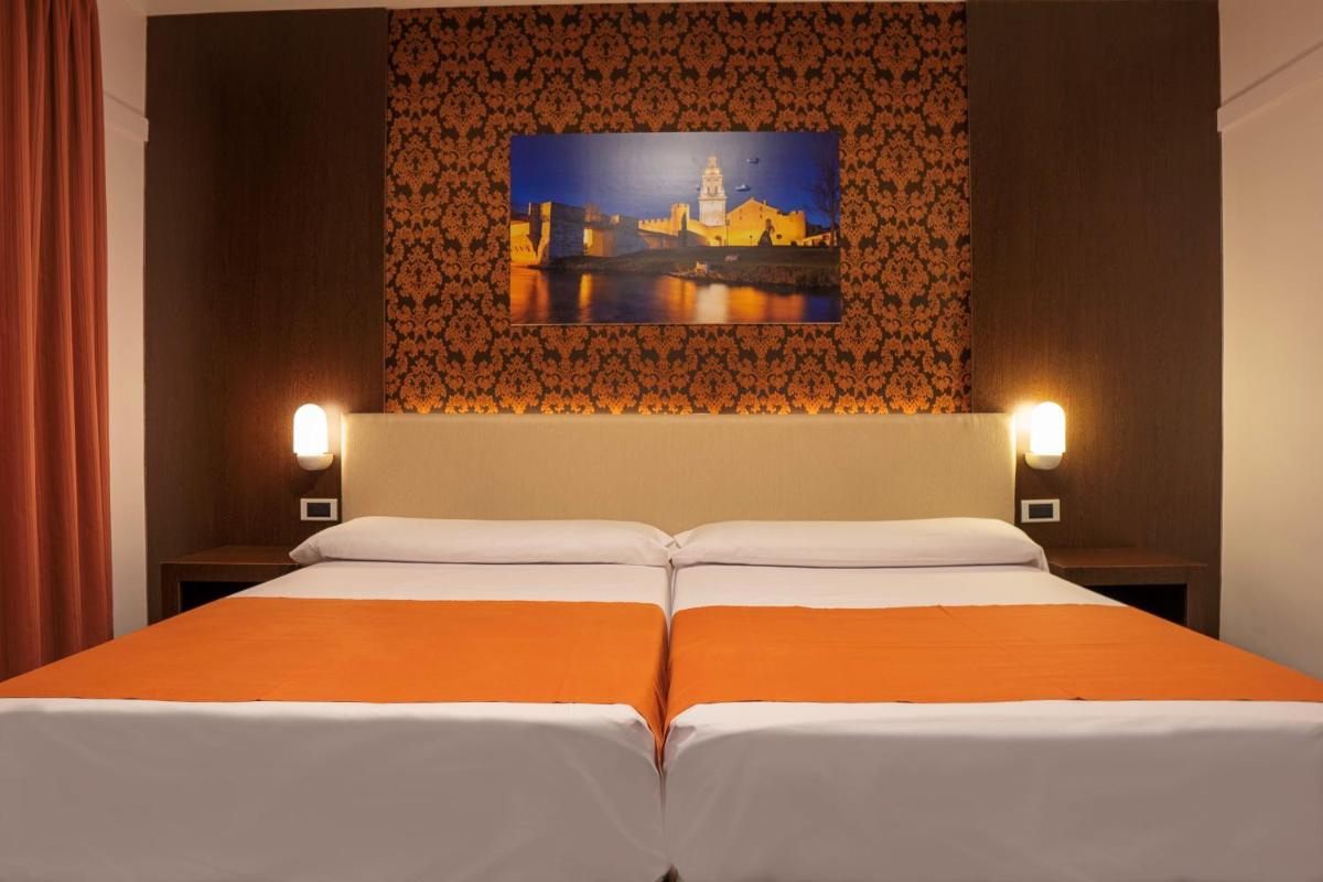 Cama o camas de una habitación en Hotel Spa Rio Ucero