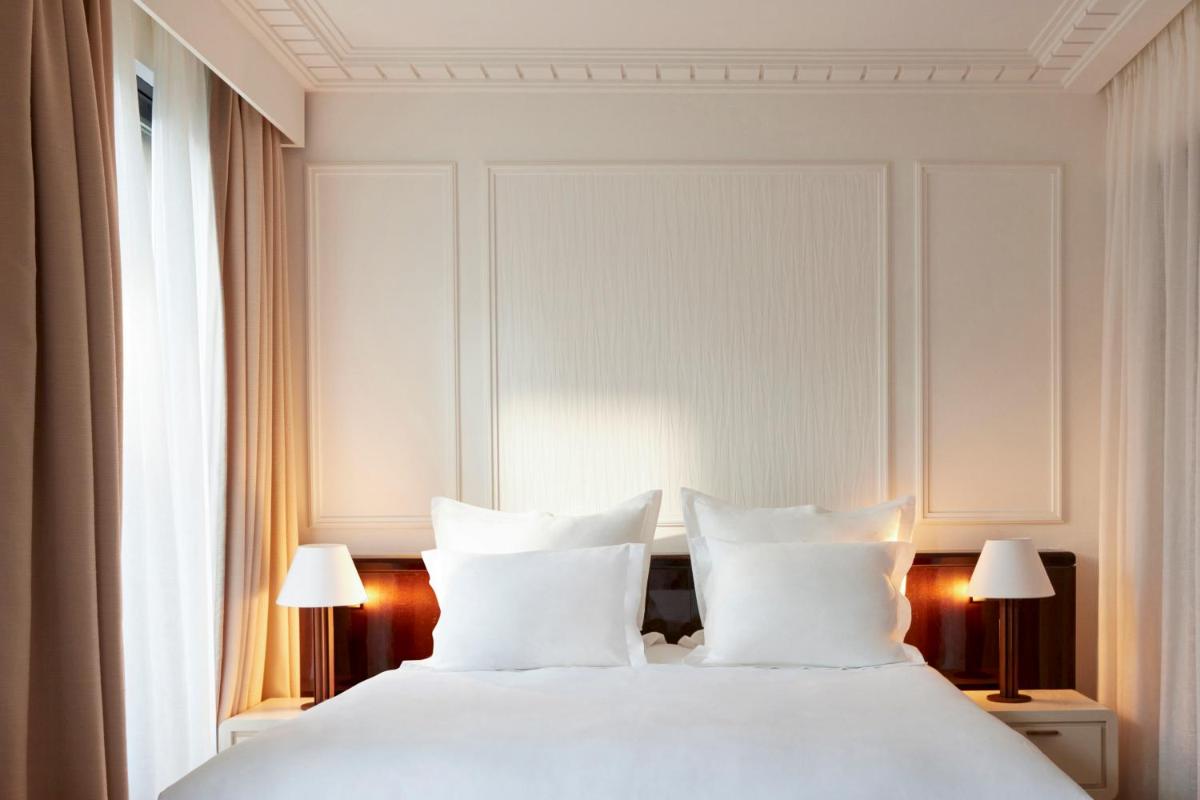 Un ou plusieurs lits dans un hébergement de l'établissement Maison Delano Paris