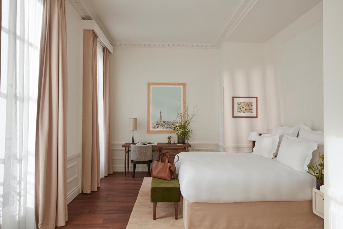Un ou plusieurs lits dans un hébergement de l'établissement Maison Delano Paris