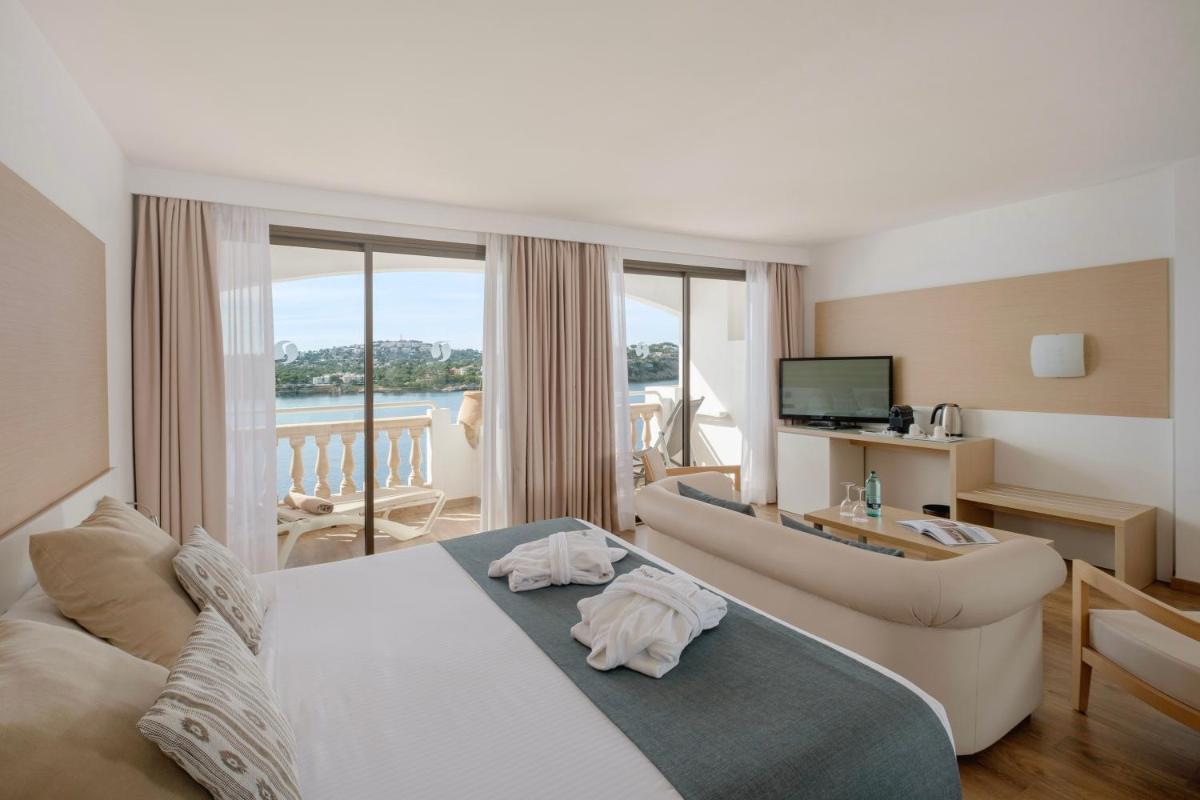 Cama o camas de una habitación en Sentido Fido Punta del Mar Hotel & Spa - Adults Only