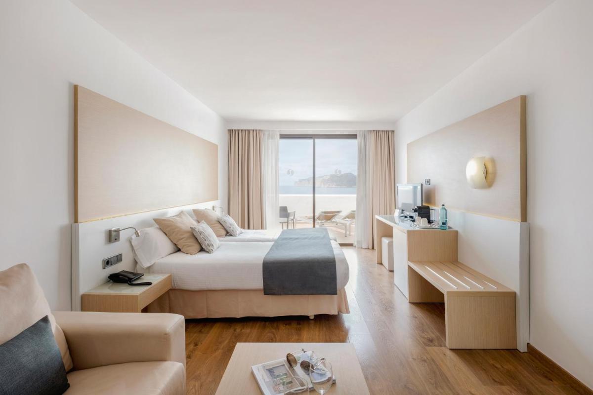 Cama o camas de una habitación en Sentido Fido Punta del Mar Hotel & Spa - Adults Only
