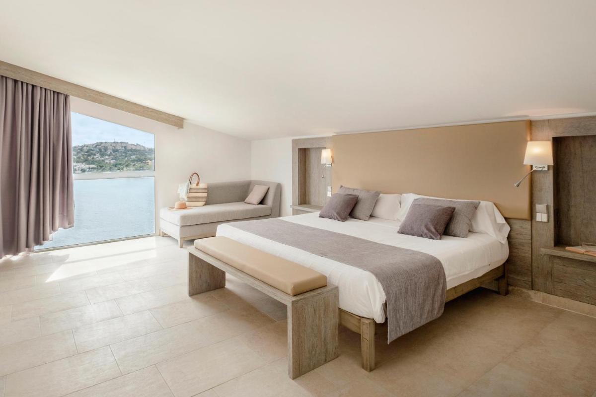 Cama o camas de una habitación en Sentido Fido Punta del Mar Hotel & Spa - Adults Only